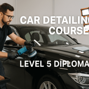 Professional car detailer polishing a luxury vehicle in a UK workshop for Car Detailing Course.